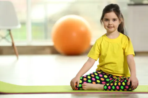 Child doing yoga